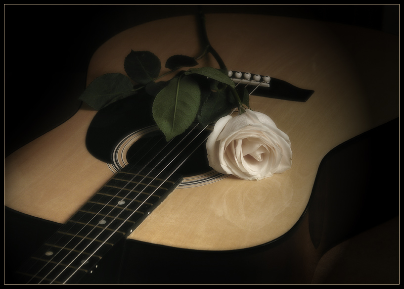 -.  . While my guitar gently weeps